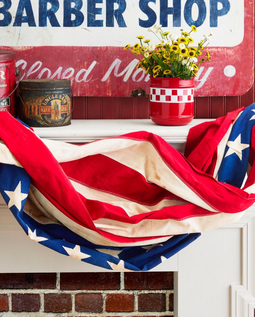 vintage flag bunting draped over a fireplace