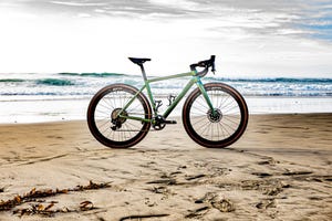 colnago c68 gravel on sand in front of ocean