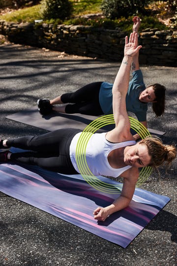 core exercises for runner two women doing a side plank on yoga mats