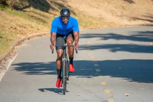 cycling athlete doing her workout in the city