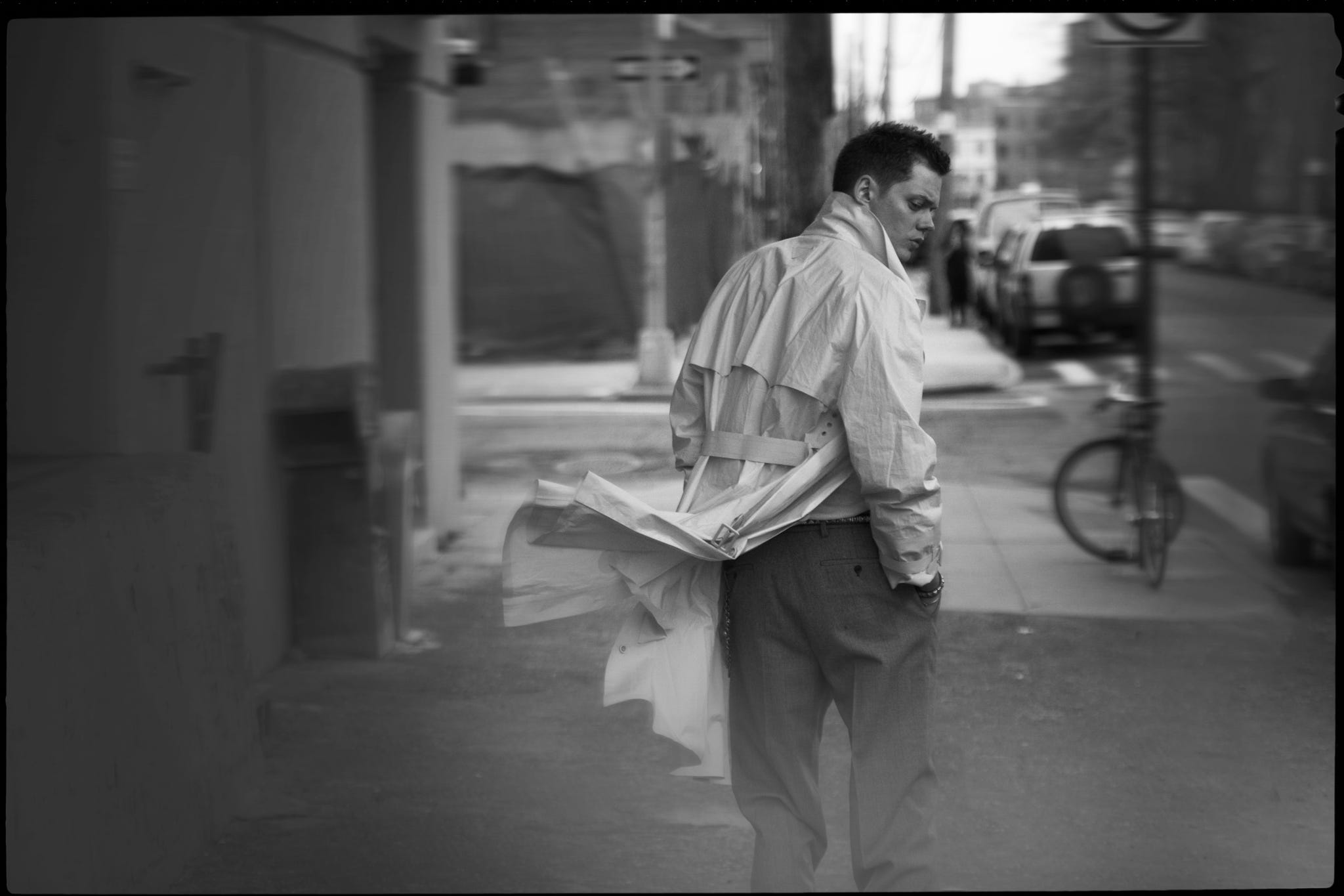 a person carrying a newspaper