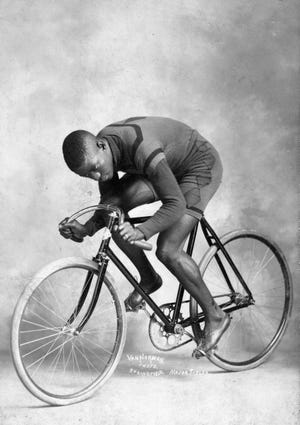 a portrait of african american cyclist major taylor