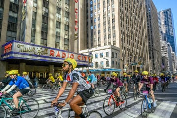 a group of people riding bikes