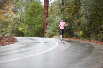 foused female athlete running