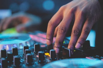 close up view of modern electrical sound mixer console during concert