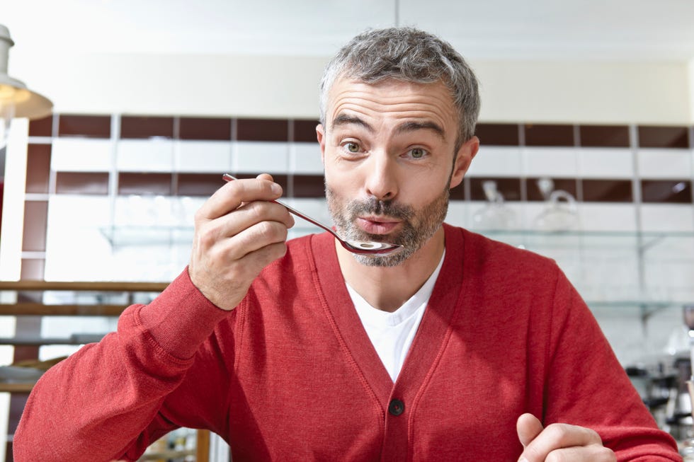 a man holding a pipe