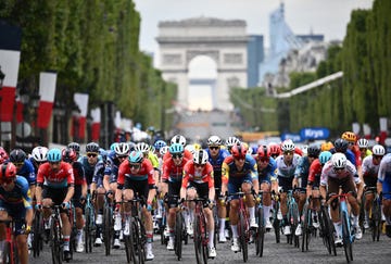 the pack cycles on the champs elysee avenue with the arc de triomphe in the background during the 21st and final stage of the 110th edition of the tour de france cycling race, 115 km between saint quentin en yvelines and the champs elysees in paris, on july 23, 2023 photo by marco bertorello  afp photo by marco bertorelloafp via getty images