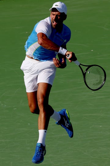 mason, ohio august 20 novak djokovic of serbia returns a shot to carlos alcaraz of spain during the final of the western southern open at lindner family tennis center on august 20, 2023 in mason, ohio photo by matthew stockmangetty images