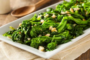 homemade sauteed green broccoli rabe with garlic and nuts