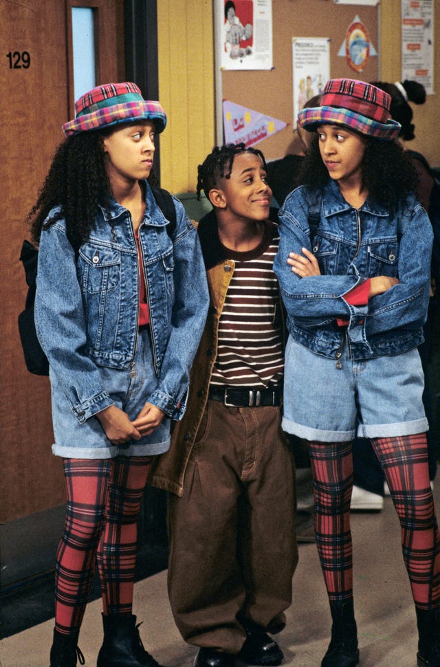 united states   september 05  sister, sister   "car trouble"   season one   5201994, the twins tia and tamera tia, left, and tamera mowry with their neighbor roger marques houston accidently scratch ray's car and lisa is blamed,  photo by walt disney television via getty images photo archiveswalt disney television via getty images