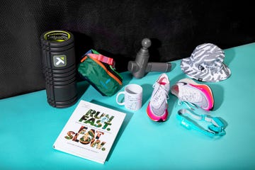 foam roller, fanny pack, bucket hat, running shoes, head lamp, strava mug, run fast eat slow book