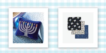 a blue throw pillow with an embroidered menorah and a photo of a set of three hanukkah themed dish cloths on a blue and white background