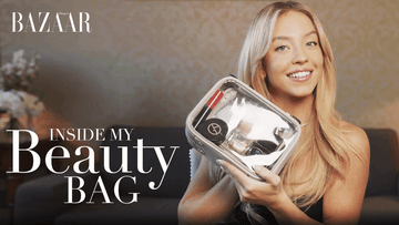 sydney sweeney holding her beauty bag