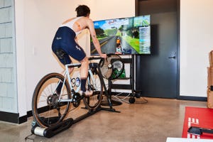 a person on a bicycle riding indoors