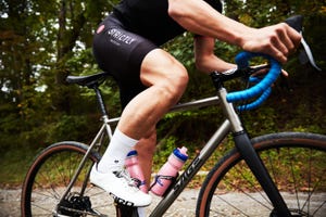 close up shot of a cyclists knee