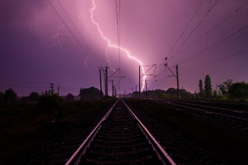 lightning over the railroad at night