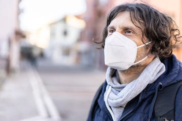 middle age man wearing in eu obligatory ffp2 kn95 n95 protective mask