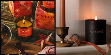 two christmas candles, one from neom and one from cowshed