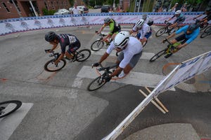 a group of people riding bikes