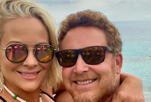 cynthia daniel and cole hausner wearing sunglasses in a vacation photo