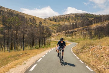 shot of a mature cyclist on a climb in the spanish mountains near jalonxalo