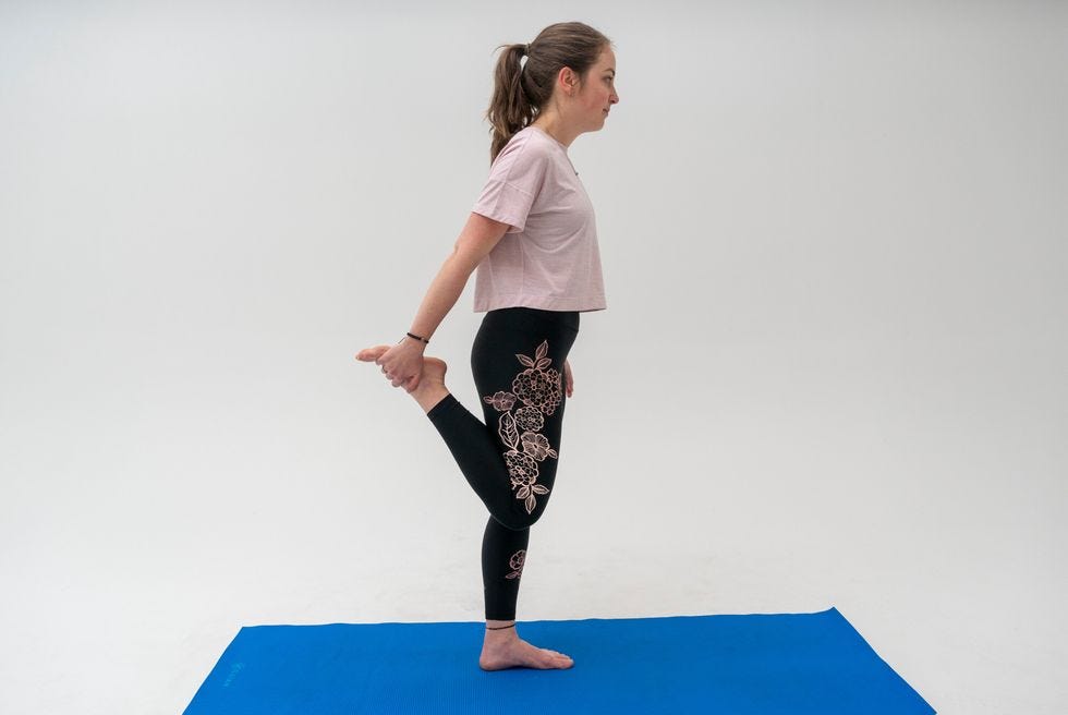 a person standing on a mat