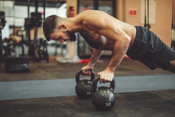 Strong man is doing cross training exercise