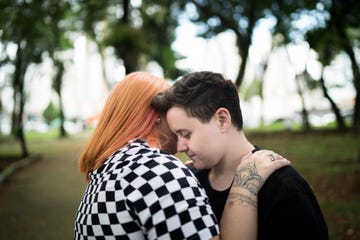 a couple hugging in the park