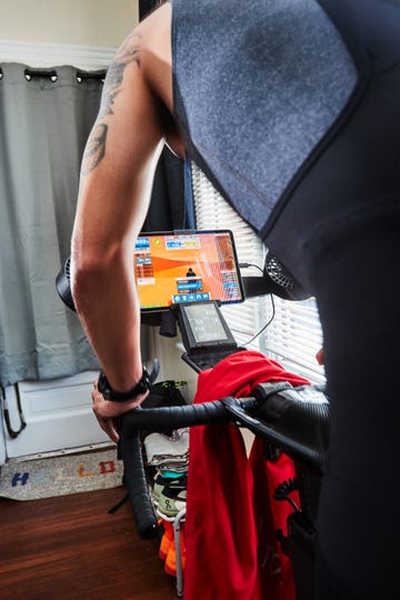 a person riding zwift on an indoor bike