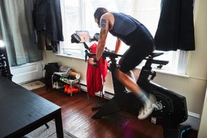 a person working out on a stationary bike