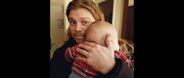 the man with 1000 children jonathan jacob meijer holds a baby