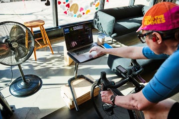 a person using zwift on an indoor trainer