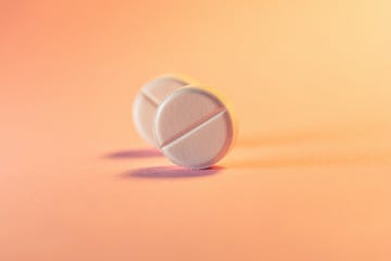 which pill is best for me two pills in an orange pink background