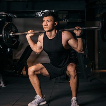 young asian bodybuilder training