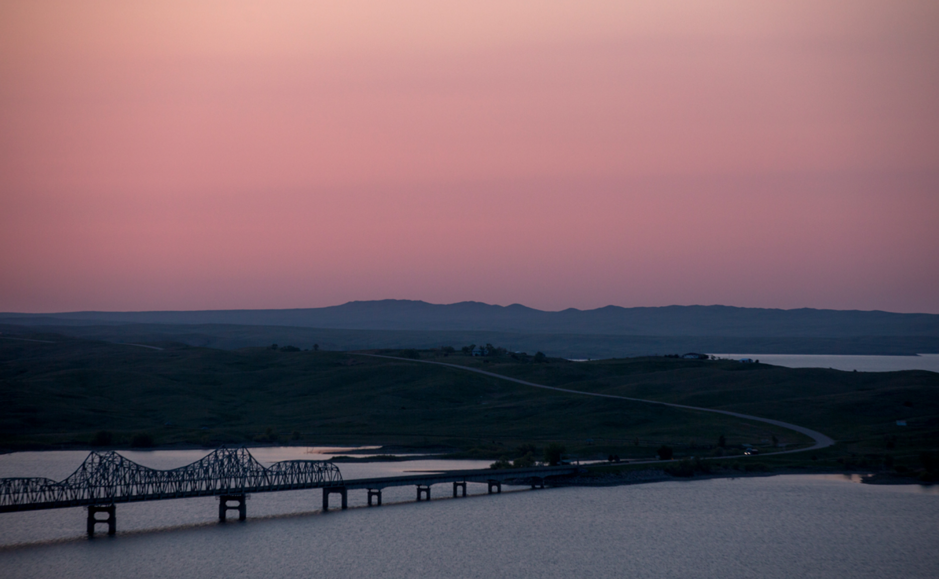 A view of the Cheyenne River Sioux Tribe Reservation from the bank of the Missouri River in Forest City, South Dakota. Nearby, there are three oil worker man camps. Kristina Barker