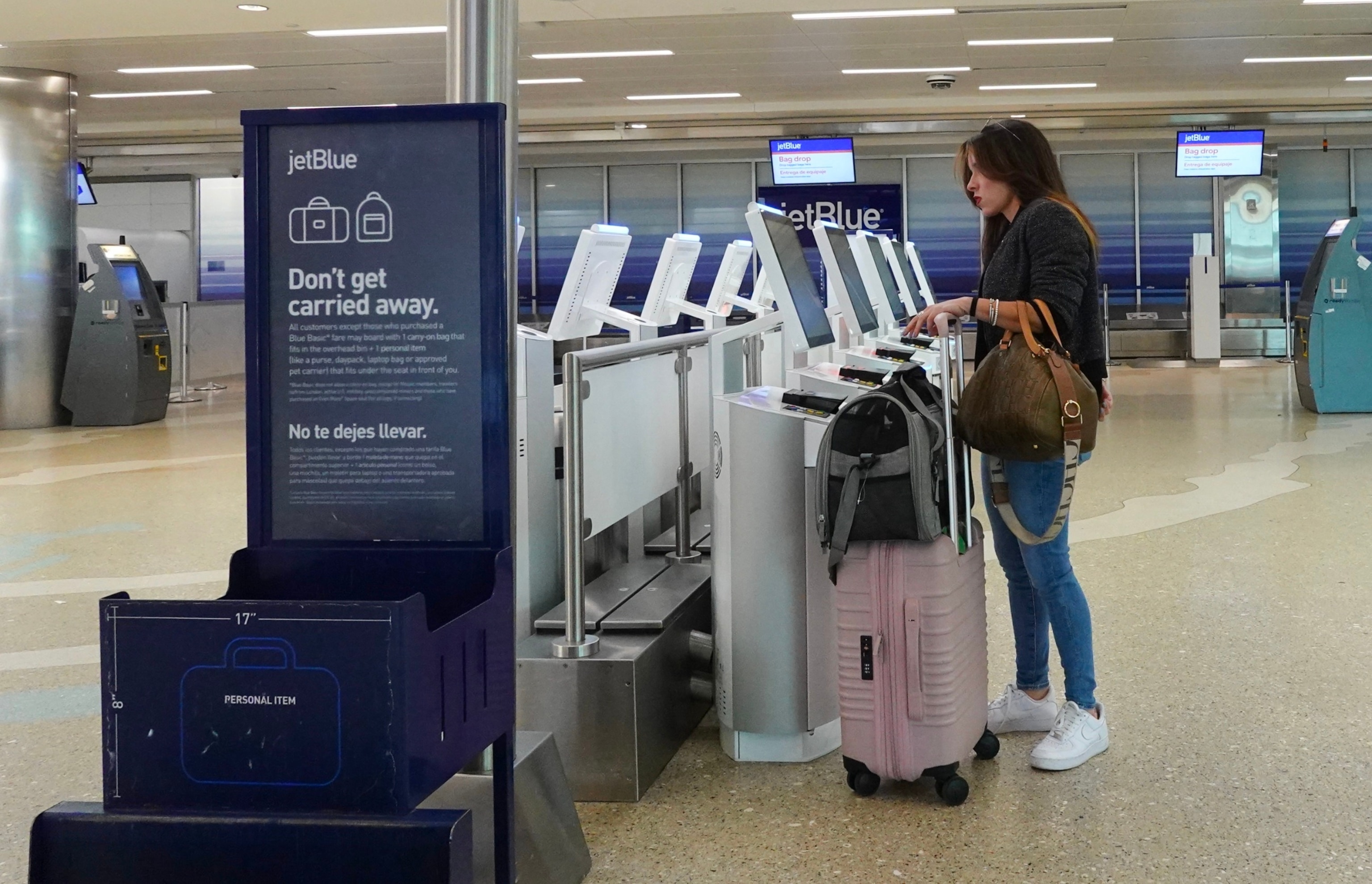 PHOTO: A person checks in at JetBlue Airways in the Fort Lauderdale-Hollywood International Airport on January 31, 2024, in Fort Lauderdale, Florida.