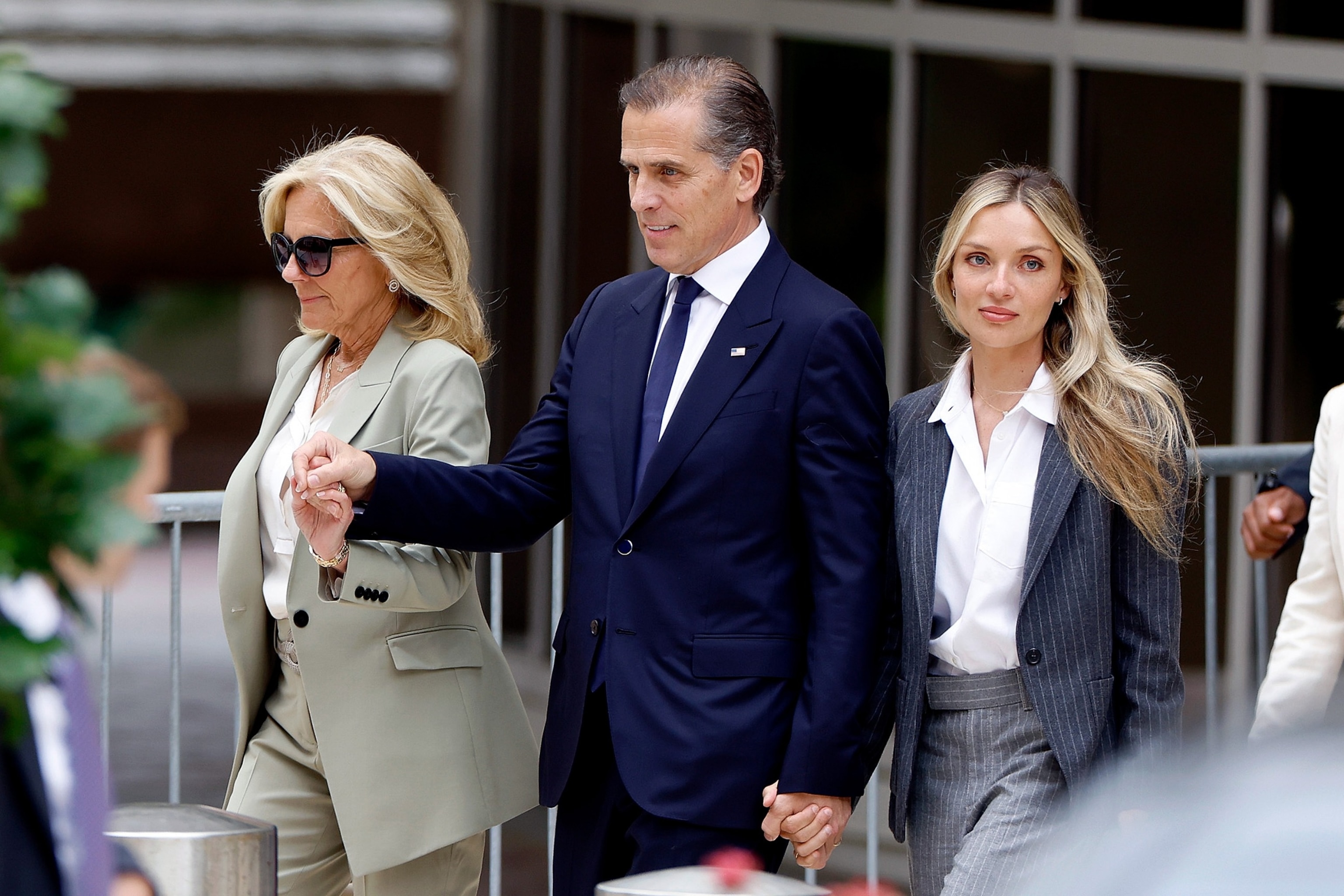 PHOTO: First lady Jill Biden, Hunter Biden, son of U.S. President Joe Biden, joined by his wife Melissa Cohen Biden, leave the J. Caleb Boggs Federal Building on June 11, 2024, in Wilmington, Del.