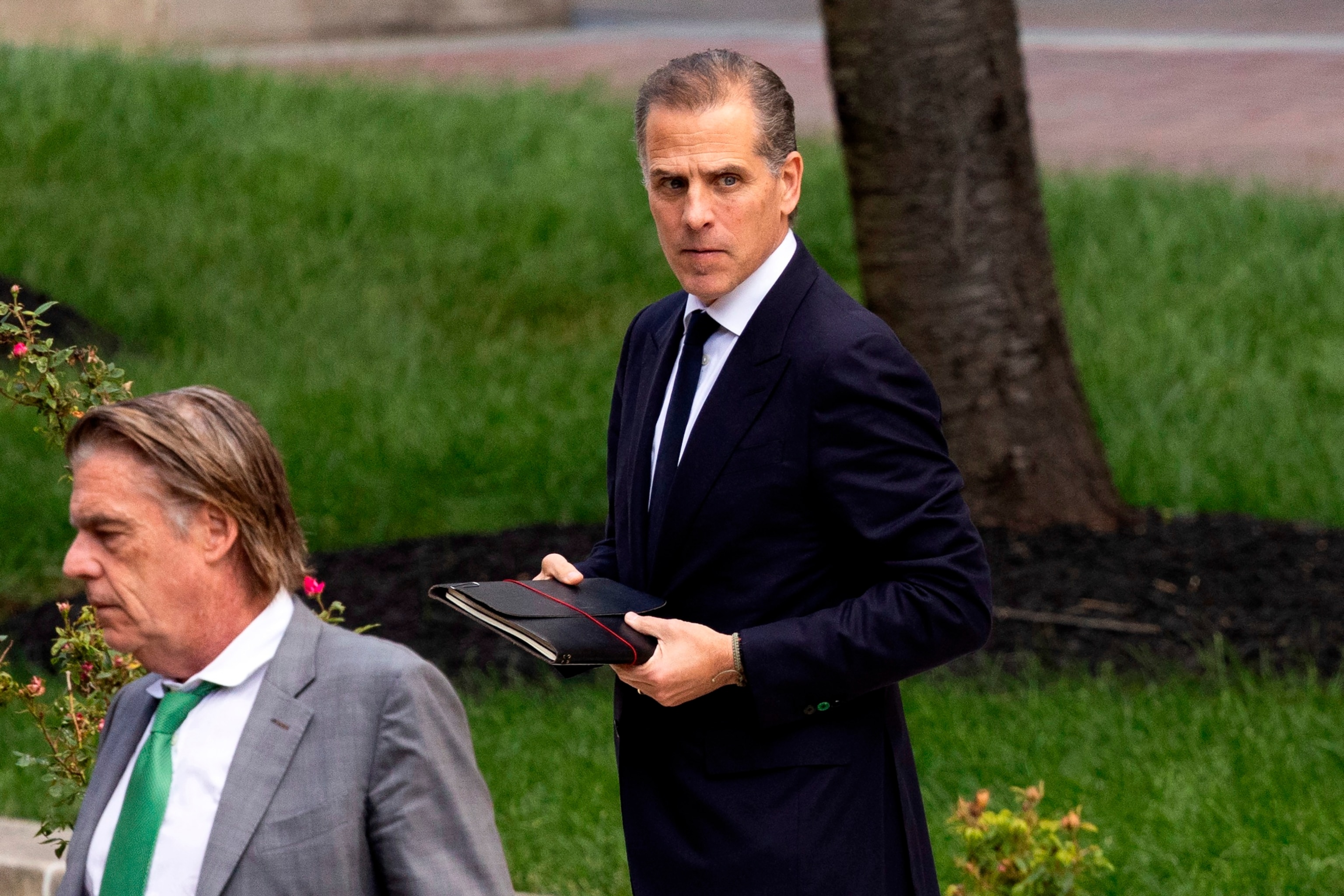 PHOTO: Hunter Biden, right, exits the J. Caleb Boggs Federal Building, June 10, 2024, in Wilmington, Del.