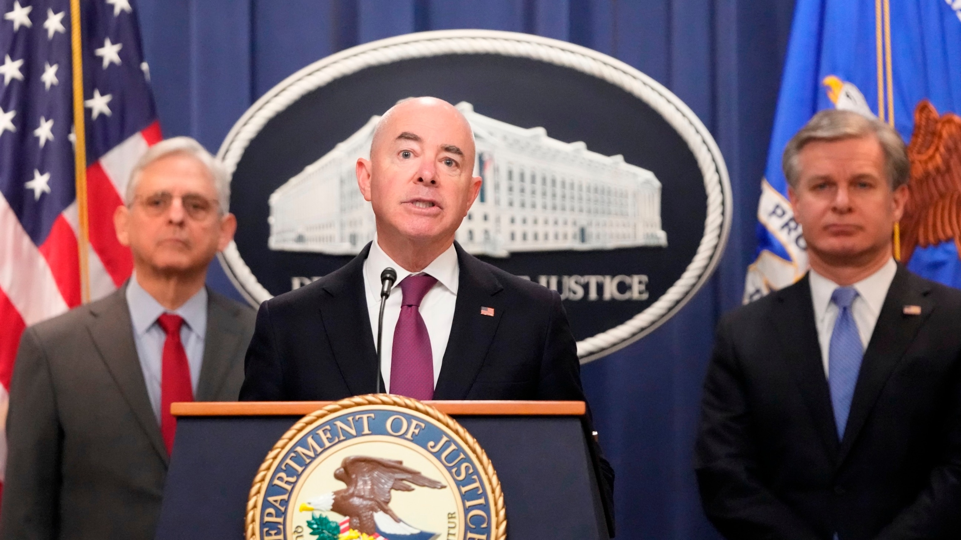 PHOTO: Secretary of Homeland Security Alejandro Mayorkas speaks with reporters during a news conference at the Department of Justice, Dec. 6, 2023, in Washington, as Attorney General Merrick Garland, left, and FBI Director Christopher Wray, look on.