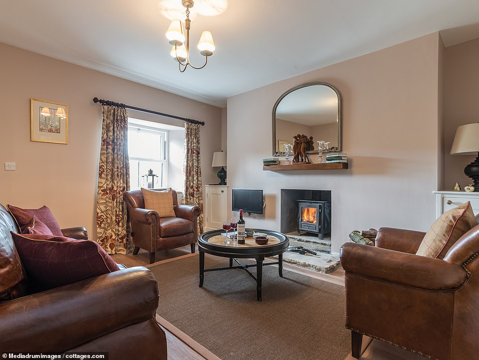 The cosy living room inside Helwith cottage, which sits on the edge of the 7,000-acre Barningham and Holgate Estate, owned by Sir Edward Milbank and his wife Lady Natalie Milbank