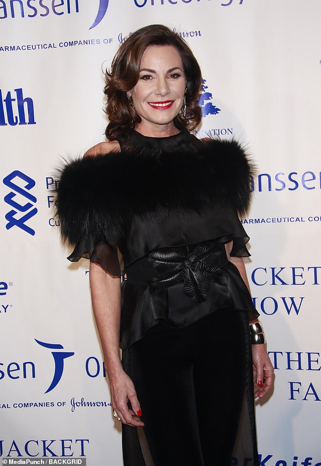 Meanwhile: The twice-divorced Luann wore her signature dark hair in elegant waves at the event, popping on a bracelet and a pair of drop earrings