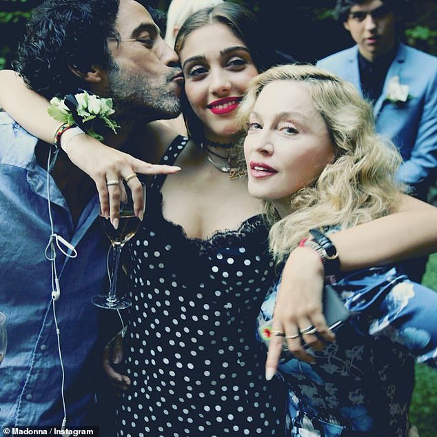 All in the family:  Lourdes' father is Carlos Leon; she is pictured with her parents that was posted on her 20th birthday in October 2016