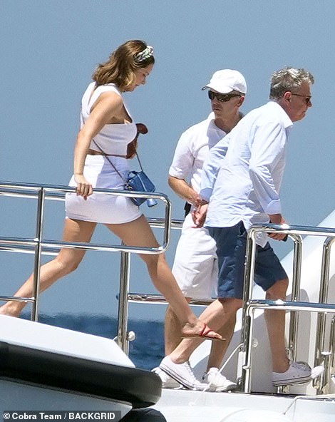 Together: Katharine and David looked smitten as they boarded the yacht together for a day at sea