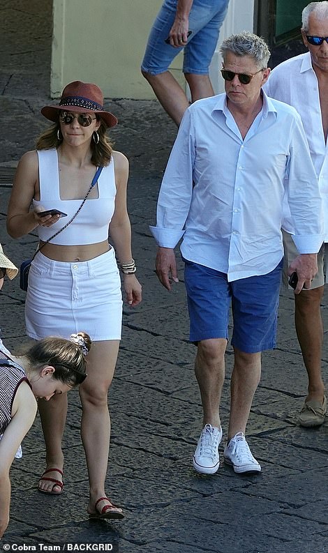 Honeymoon: They have been making the most of their sun-drenched getaway in Italy after tying the knot at the St Yeghiche Armenian Church in South Kensington, London on Friday