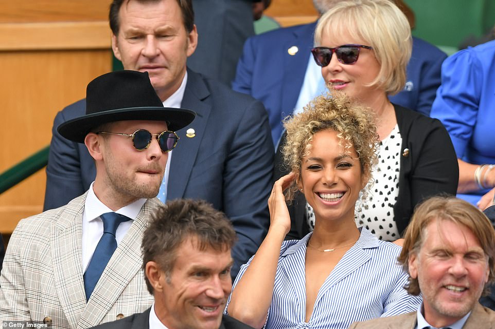 Rare public appearance: Pop star Leona Lewis, right, and fiancé Dennis Jauch, left, appeared in excellent spirits today