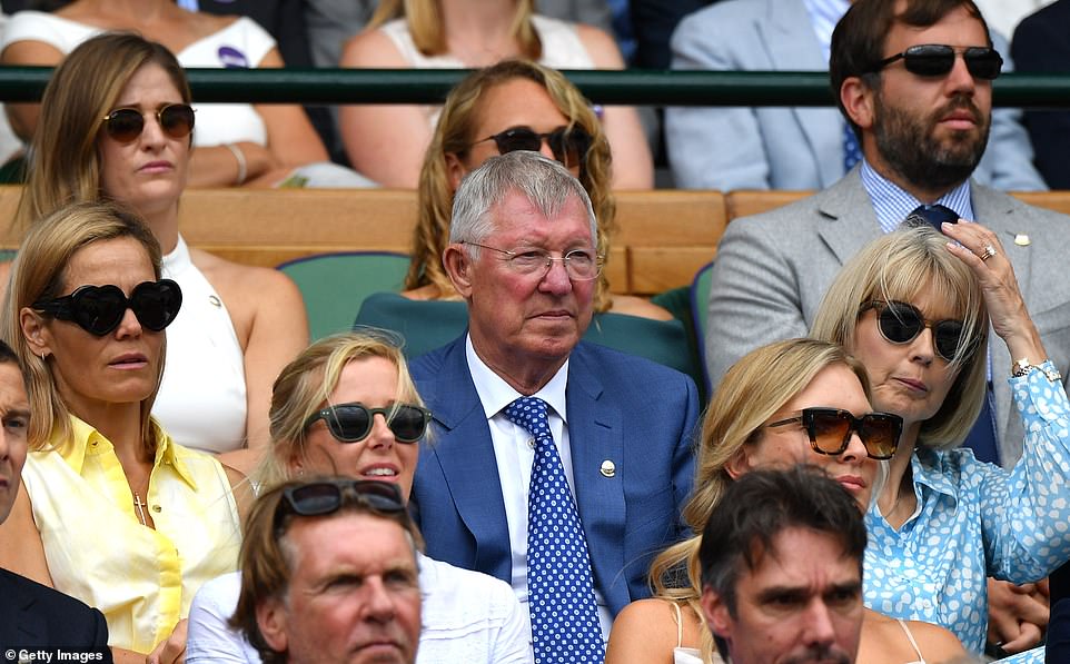 Family outing: Sir Alex Fergsuon, centre, stepped out with his daughter-in-law Fiona, left in yellow, this afternoon