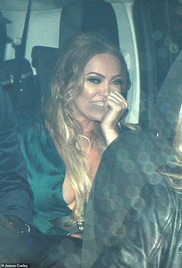 Late night: Aisleyne Horgan-Wallace, 40, looked worse for wear as she left the National Reality TV Awards in London in a cab on Monday night