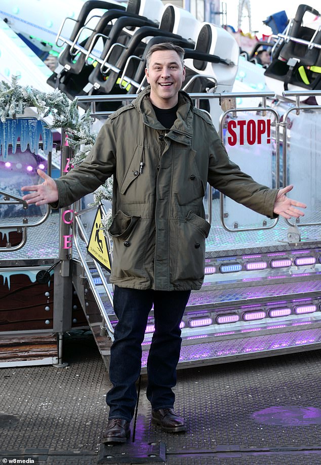 Cheery: BGT judge David Walliams appeared in great spirits as he also enjoyed a fun-filled day at the seasonal park