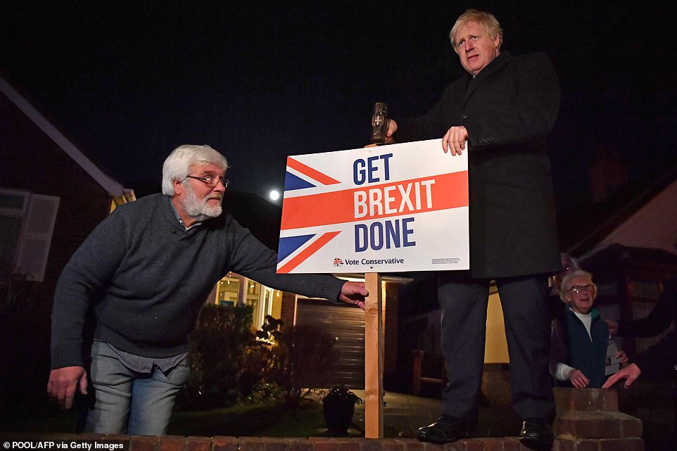 Hammering the Brexit message: The PM has spent the final day of campaigning on a cross-country blitz of marginal seats, ending in Benfleet, Essex, where he used a sledgehammer to plant a Conservative sign in an activist's garden