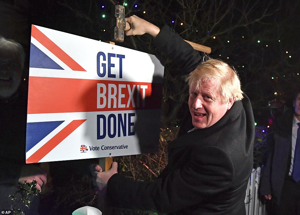 The PM - buoyed by a final poll putting him on course to clinch a majority - smiles as he plants a Conservative Brexit sign in Essex